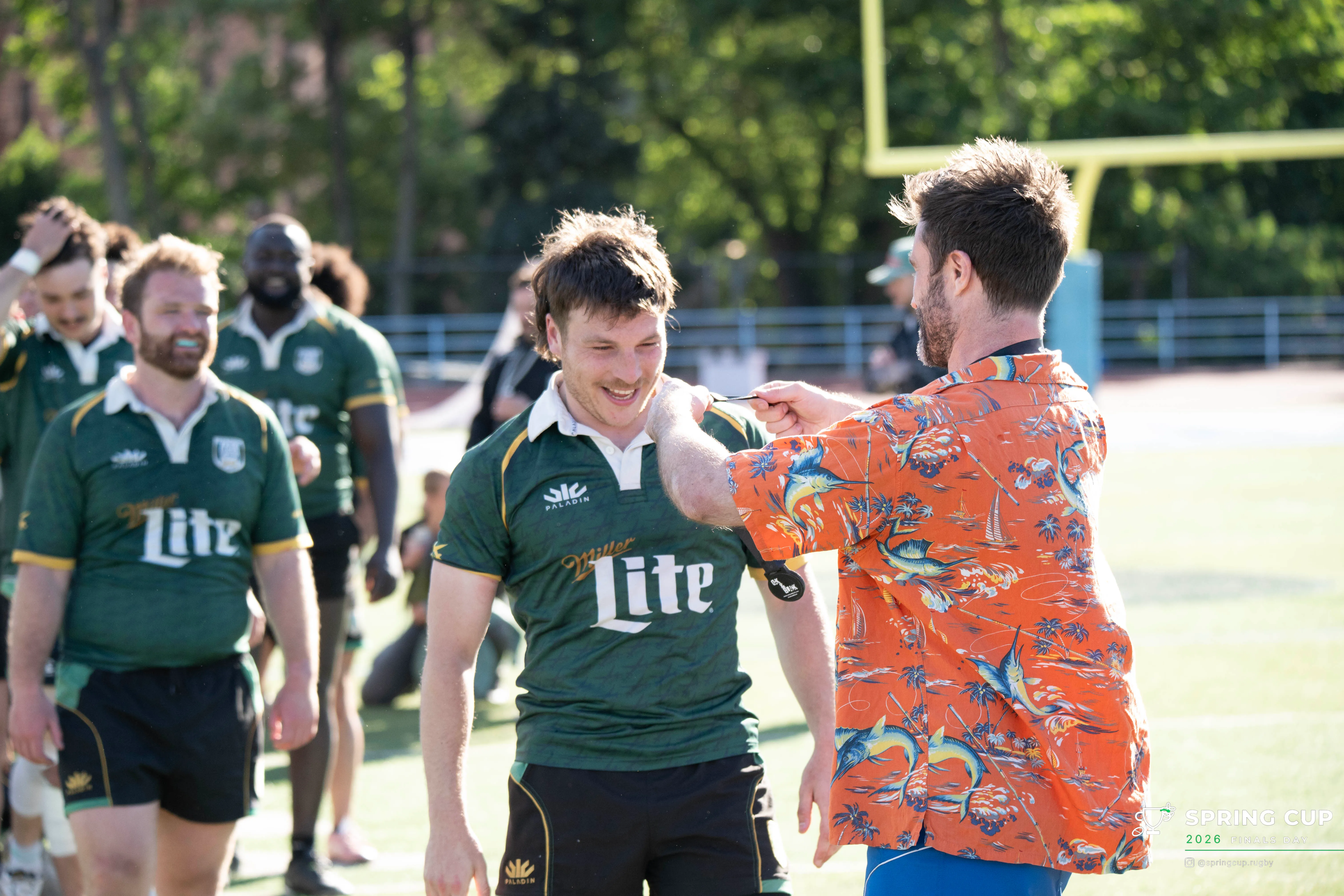 A player receives his winners medal on finals day